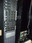Pictured on the left is a rack that housed servers, switches and storage area network devices previously used to manage storage for the Organizational Messaging Service. The Hyper-Converged Infrastructure system pictured on the right, is a virtualization solution that replaces traditional servers, and combines storage and compute functions into a single machine to save cost, energy and space. Marine Corps Systems Command’s Information Systems and Infrastructure recently installed the technology at Camp Lejeune, North Carolina, and Camp Pendleton, California, to support OMS, which is used to send operational and administrative messages across the Corps. (Courtesy photo)