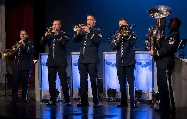 Members of Offutt Brass play the Air Force Song during a performance at the Performing Arts Center Historic Theater in Rapid City, S.D., on Feb. 22, 2017. Offutt Brass is the brass ensemble of the U.S. Air Force Heartland of America Band that performs around the U.S. to celebrate America and patriotism. (U.S. Air Force photo by Airman 1st Class Randahl J. Jenson)