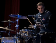 U.S. Air Force Staff Sgt. Ed Zaryky, the drummer for Offutt Brass, reads his sheet music during a performance at the Performing Arts Center Historic Theater in Rapid City, S.D., on Feb. 22, 2017. Offutt Brass is the brass ensemble of the U.S. Air Force Heartland of America Band that performs around the U.S. to celebrate America and patriotism. (U.S. Air Force photo by Airman 1st Class Randahl J. Jenson)