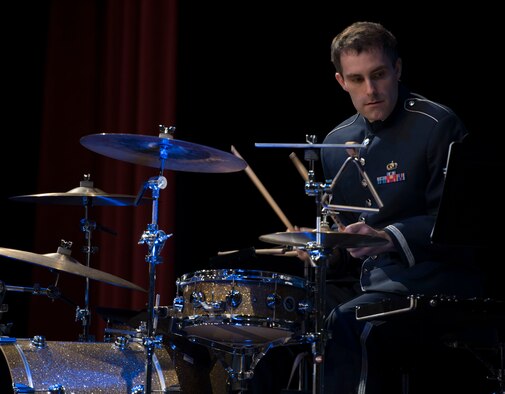 U.S. Air Force Staff Sgt. Ed Zaryky, the drummer for Offutt Brass, reads his sheet music during a performance at the Performing Arts Center Historic Theater in Rapid City, S.D., on Feb. 22, 2017. Offutt Brass is the brass ensemble of the U.S. Air Force Heartland of America Band that performs around the U.S. to celebrate America and patriotism. (U.S. Air Force photo by Airman 1st Class Randahl J. Jenson)