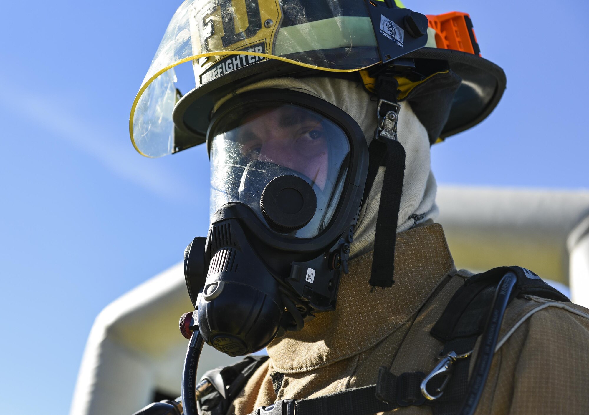 Airman 1st Class Nicholas Gough, 23d Civil Engineer Squadron firefighter, waits for the next Airman to approach the decontamination wash pit during a chemical, biological, radiological and nuclear defense exercise, Feb. 16, at Moody Air Force Base, Ga. Moody’s Wing Inspection Team tested the 23d CES fire department, emergency management flight and bioenvironmental flight on procedures, response and effective communication between the units. (U.S. Air Force photo by Airman 1st Class Janiqua P. Robinson)