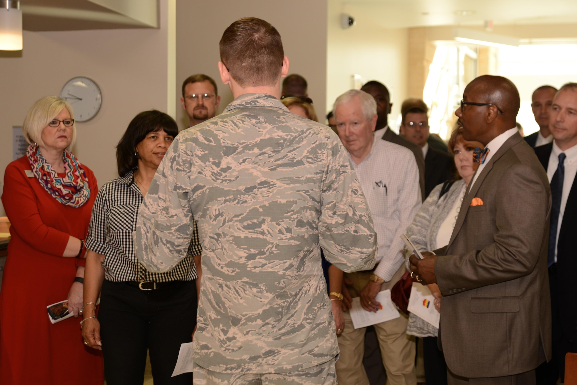 U.S. Air Force Capt. Aaron Eldridge, 20th Medical Group project health facilities officer, center, speaks to Team Shaw members and civilians during a tour of the new medical building at Shaw Air Force Base, S.C., Feb. 24, 2017. The new facility was designed to improve patient flow and help the 20th Medical Group support the medical needs of approximately 31,000 eligible beneficiaries. (U.S. Air Force photo by Airman 1st Class Kathryn R.C. Reaves)