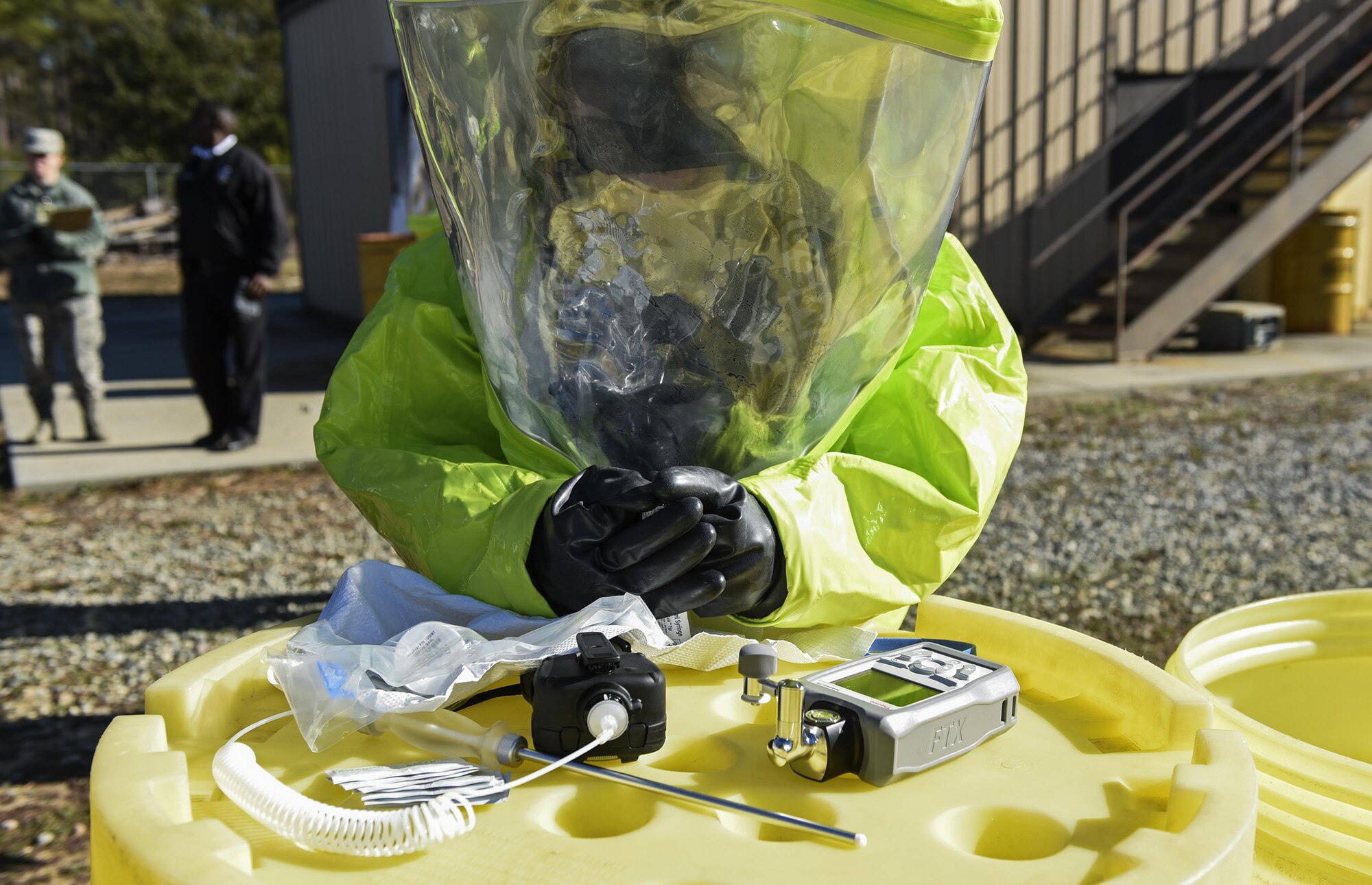 An Airman from the 23d Civil Engineer Squadron bioenvironmental flight identifies hazardous material during a chemical, biological, radiological and nuclear defense exercise, Feb. 16, at Moody Air Force Base, Ga. Moody’s Wing Inspection Team tested the 23d CES fire department, emergency management flight and bioenvironmental flight on procedures, response and effective communication between the units. (U.S. Air Force photo by Airman 1st Class Janiqua P. Robinson)