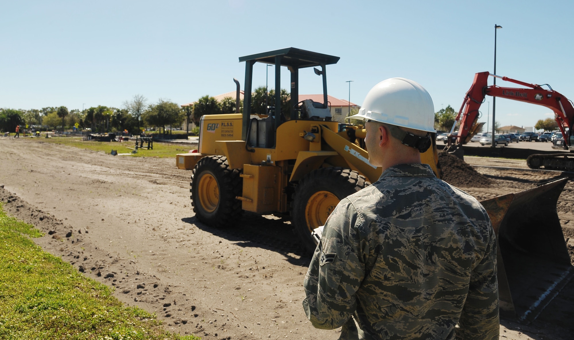 Airman 1st Class Jean Suazo, a contract specialist assigned to the 6th Contracting Squadron performs a construction site survey at MacDill Air Force Base, Fla., Feb. 24, 2017. Specialists like Suazo periodically conduct surveys of projects they’ve helped create to ensure workers are being paid what was agreed on in the contract. (U.S. Air Force photo by Airman 1st Class Adam R. Shanks)