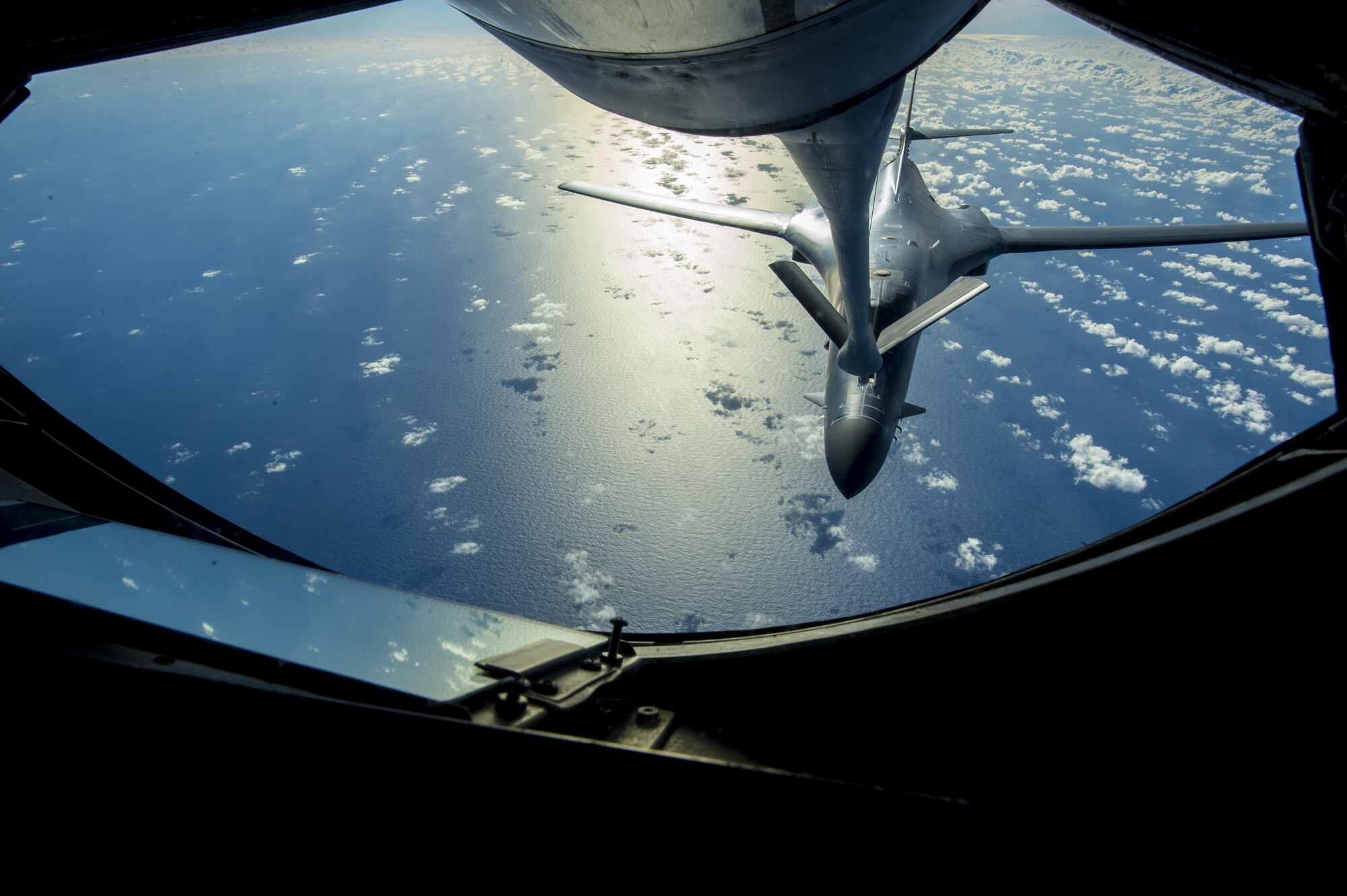 A U.S. Air Force B-1B Lancer assigned to the 9th Expeditionary Bomb Squadron approaches the boom pod of a KC-135 Stratotanker assigned to the 909th Aerial Refueling Squadron to receive fuel during Cope North 2017, Feb. 22, 2017. The exercise includes 22 total flying units and more than 2,700 personnel from three countries and continues the growth of strong, interoperable relationships within the Indo-Asia-Pacific region through integration of airborne and land-based command and control assets. (U.S. Air Force photo by Senior Airman Keith James)