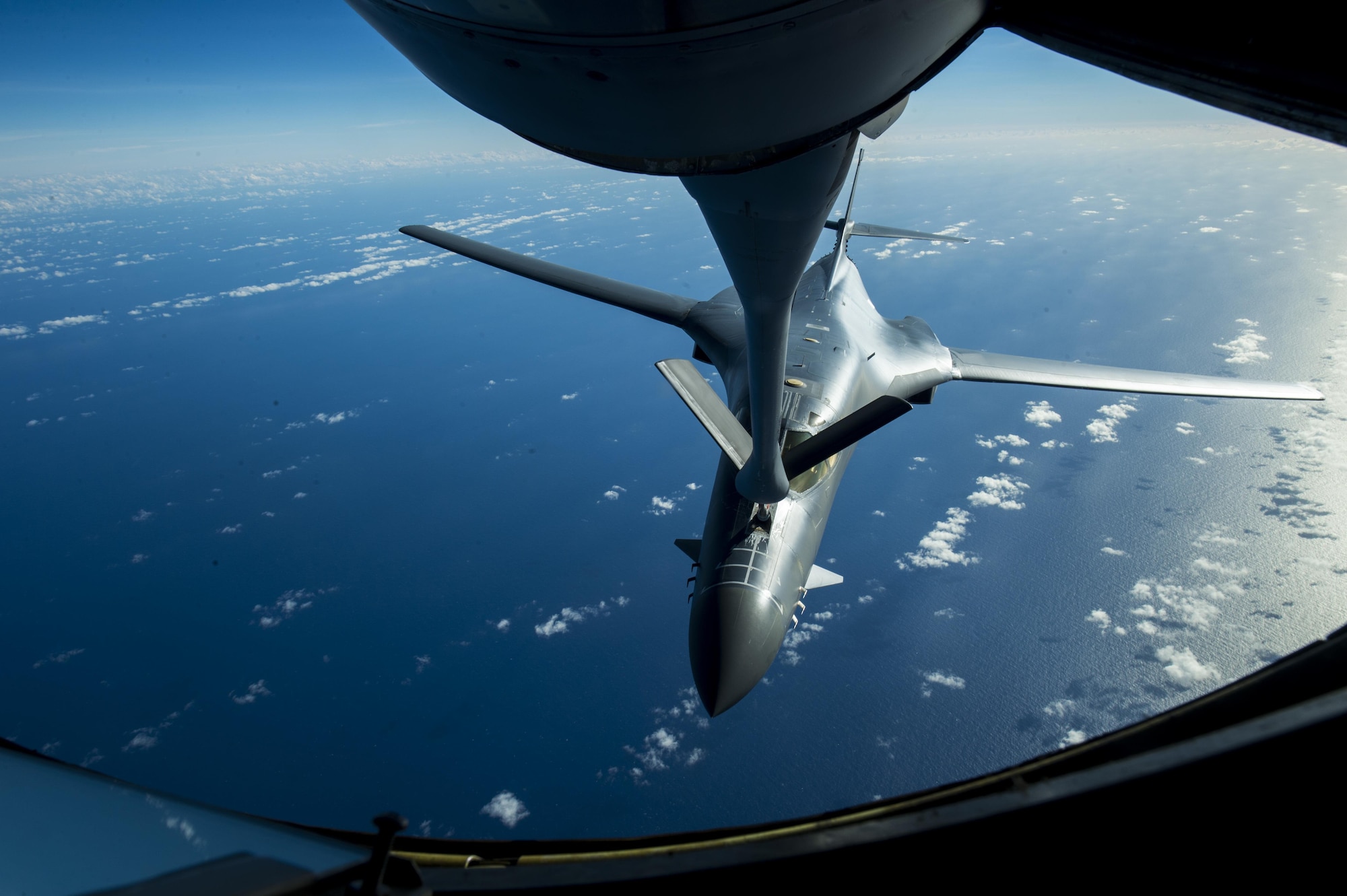 A U.S. Air Force B-1B Lancer assigned to the 9th Expeditionary Bomb Squadron receives fuel from the boom pod of a KC-135 Stratotanker assigned to the 909th Aerial Refueling Squadron during Cope North 2017, Feb. 22, 2017. The exercise includes 22 total flying units and more than 2,700 personnel from three countries and continues the growth of strong, interoperable relationships within the Indo-Asia Pacific Region through integration of airborne and land-based command and control assets. (U.S. Air Force Photo by Senior Airman Keith James)