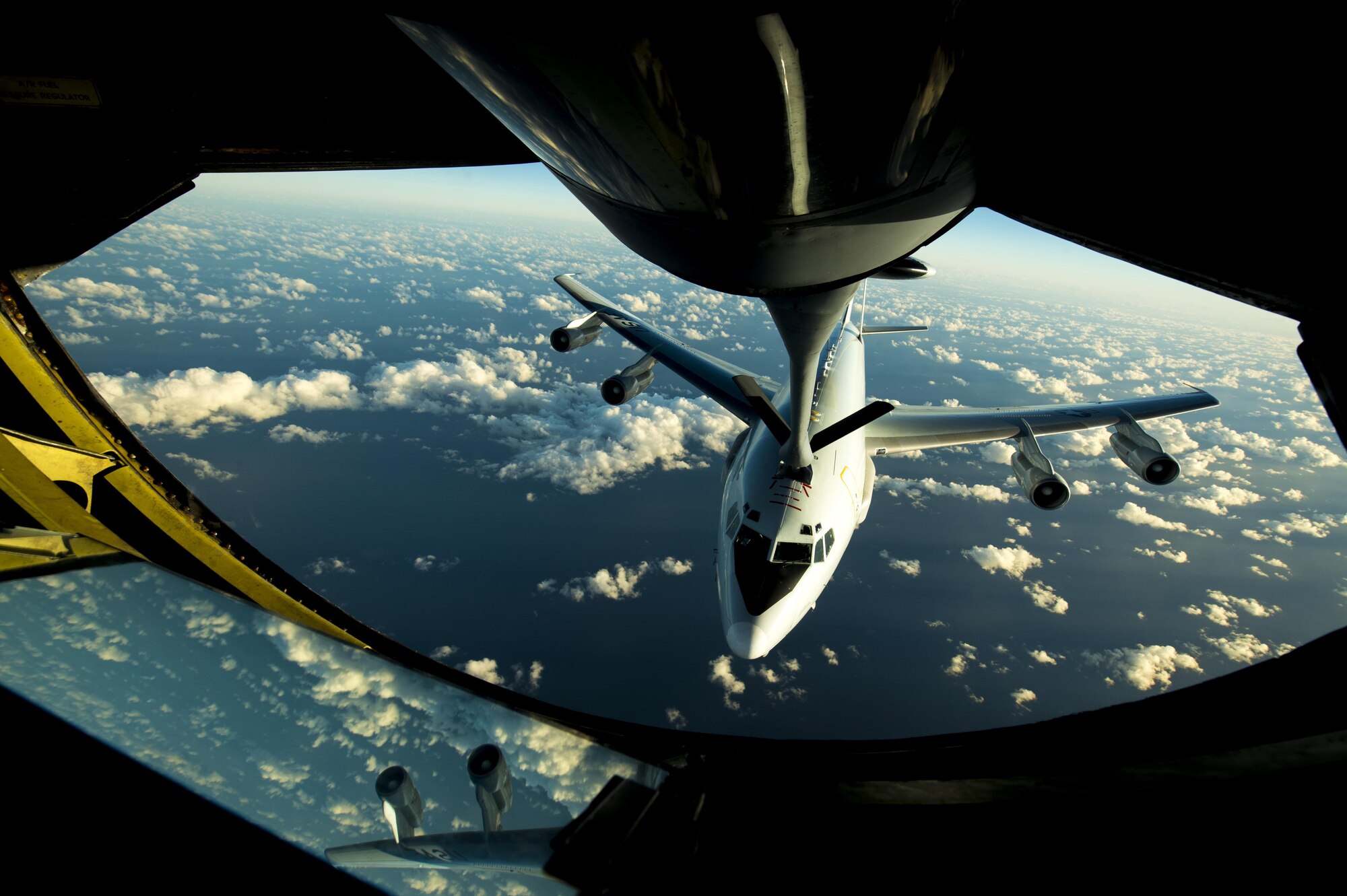 An E-3 Sentry assigned to the 961st Airborne Air Control Squadron receives fuel from the boom pod of a KC-135 Stratotanker assigned to the 909th Aerial Refueling Squadron during Cope North 2017, Feb. 22, 2017. The exercise includes 22 total flying units and more than 2,700 personnel from three countries and continues the growth of strong, interoperable relationships within the Indo-Asia-Pacific region through integration of airborne and land-based command and control assets. (U.S. Air Force photo by Senior Airman Keith James)