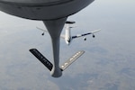 A NATO AWACS lines up with an Iowa Air National Guard KC-135 aircraft for refueling training over northern Germany Feb. 14 2017. Members of the 185th Air Refueling Wing from Sioux City Iowa operate the KC-135 aircraft and are providing fuel for the training of NATO AWACS. (U.S. Air Force photo by  Staff Sgt. Daniel Ter Haar)