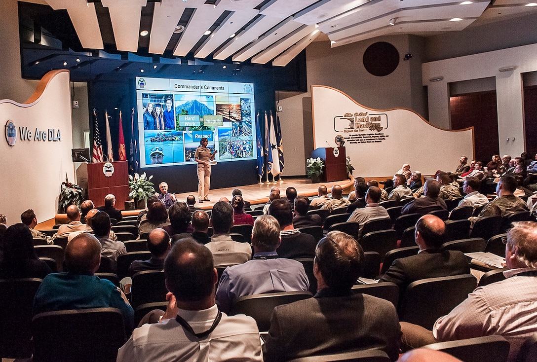 Navy Rear Adm. Michelle Skubic speaks at her first Town Hall as commander of DLA Land and Maritime. The Feb. 15 event provided updates on new DoD employee performance standards and the scheduled audit review currently underway across the agency.