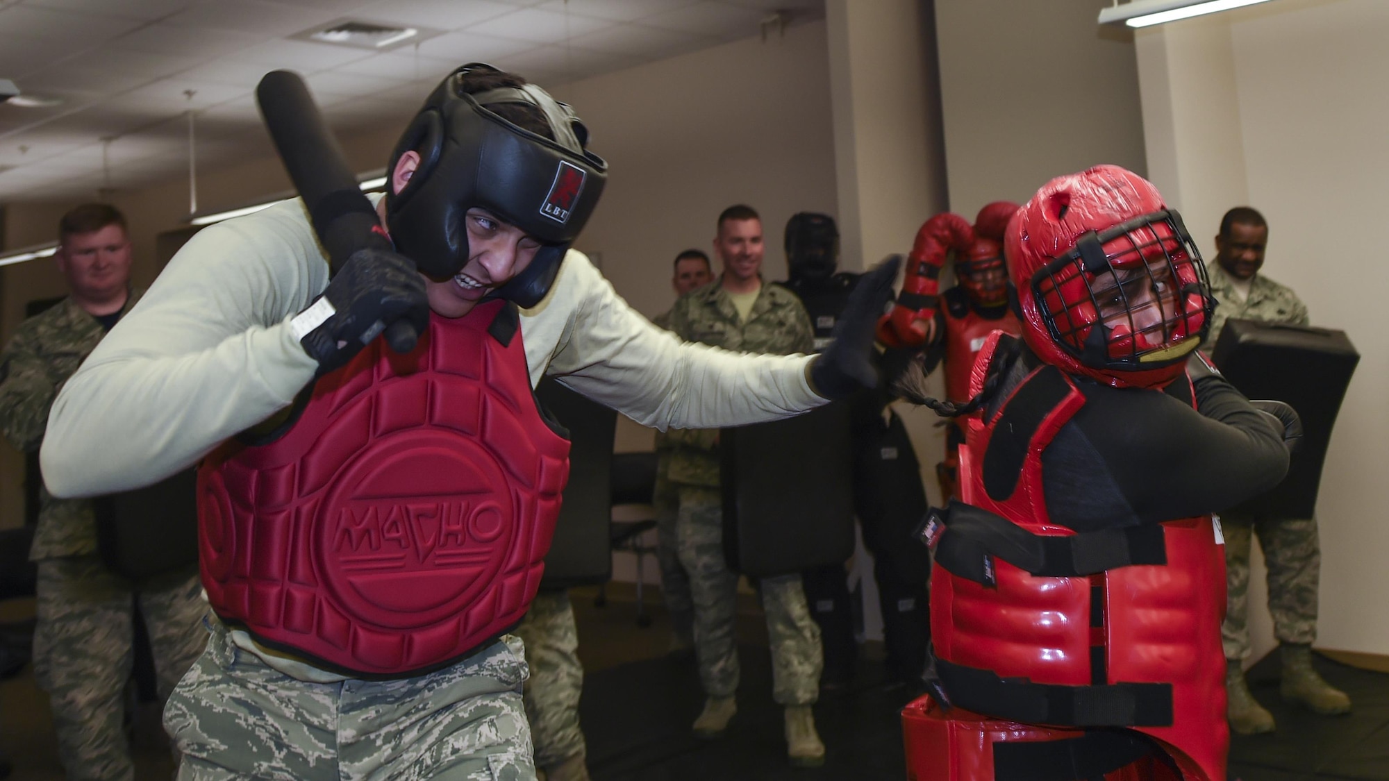 U.S. Air Force Airman 1st Class Nicholas Pineda, defends himself against Staff Sgt. Madonna Henard, both 19th Security Forces Squadron patrolmen, during Phoenix Raven pre-training Feb. 17, 2017, at Little Rock Air Force Base, Ark. There are currently four 19th SFS Ravens that protect aircraft, crews and cargo from criminal and terrorist threats while traveling through airfields where security is either unknown or inadequate. (U.S. Air Force photo/Senior Airman Harry Brexel)