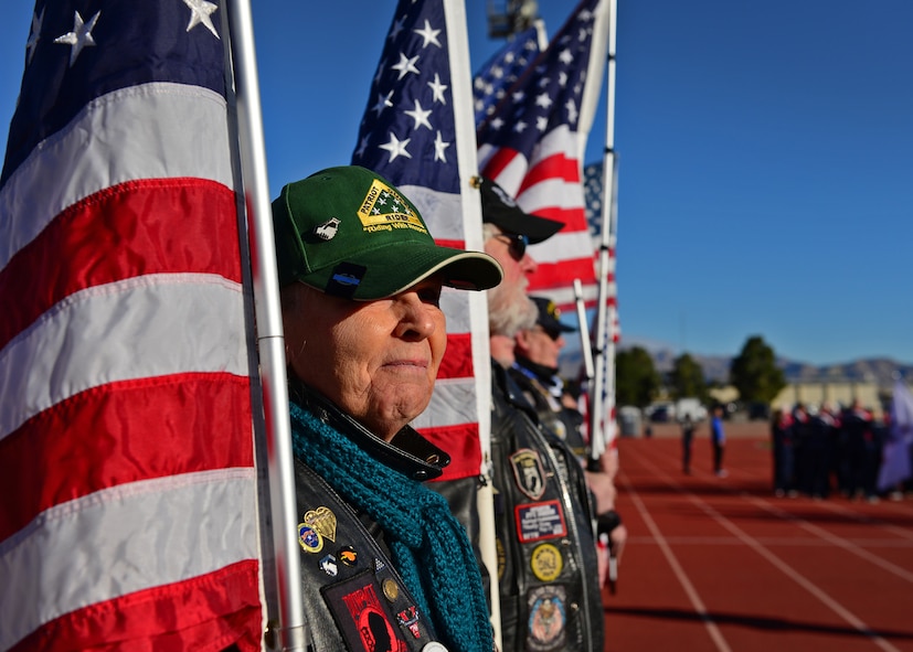 A member of the Patriot Guard Riders welcomes competitors of the 2017 Air Force Warrior Game Trials outside the Warrior Fitness Center Feb. 24, 2017 at Nellis Air Force Base, Nev. These trials are part of an adaptive sports program, headed by the Wounded Warrior Program, designed to promote the mental and physical wellbeing of seriously wounded, ill and injured military members and veterans. (U.S. Air Force photo by Senior Airman Chip Pons)