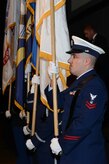 The joint service color guard performs a flag ceremony during the ASYMCA’s 40th annual Salute to the Military at the Dena’ina Center, Anchorage, Alaska, Feb. 18, 2017. Since the Navy League’s conception of the ASYMCA in 1977, the program has annually honored all branches of service and has become the longest-running annual event hosted by a non-profit organization.