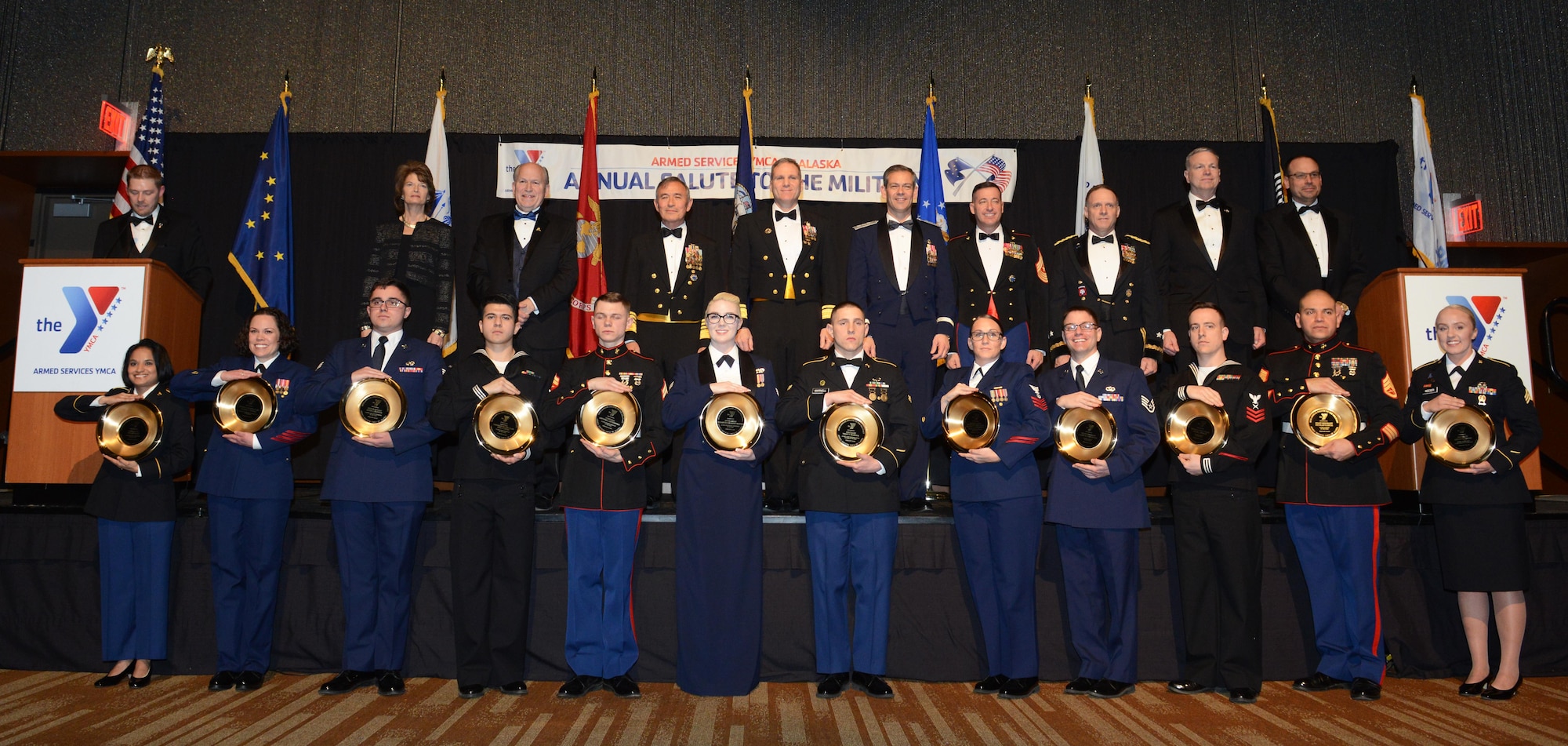 Twelve of the most exceptional enlisted service members representing each active duty, guard and reserve branch are honored during the ASYMCA’s 40th annual Salute to the Military at the Dena’ina Center, Anchorage, Alaska, Feb. 18, 2017. Since the Navy League’s conception of the ASYMCA in 1977, the program has annually honored all branches of service and has become the longest-running annual event hosted by a non-profit organization. 