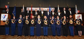 Twelve of the most exceptional enlisted service members representing each active duty, guard and reserve branch are honored during the ASYMCA’s 40th annual Salute to the Military at the Dena’ina Center, Anchorage, Alaska, Feb. 18, 2017. Since the Navy League’s conception of the ASYMCA in 1977, the program has annually honored all branches of service and has become the longest-running annual event hosted by a non-profit organization. 