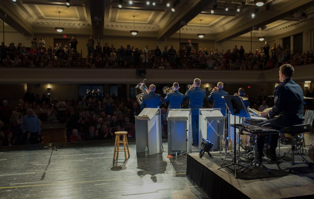 Members of the audience stand near the end of the Offutt Brass performance at the Performing Arts Center Historic Theater in Rapid City, S.D., on Feb. 22, 2017. Offutt Brass is the brass ensemble of the U.S. Air Force Heartland of America Band that performs around the U.S. to celebrate America and patriotism. (U.S. Air Force photo by Airman 1st Class Randahl J. Jenson)