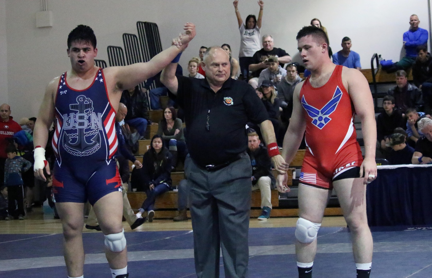 Navy Petty Officer 2nd Class Zachahria Manning (Blue) defeats Airman 1st Class James Shreve in the 125kg weight class to pull Navy ahead of Air Force for third place in the 2017 Armed Forces Freestyle competition of the Armed Forces Wrestling Championship at Joint Base McGuire-Dix-Lakehurst, New Jersey on 26 February.