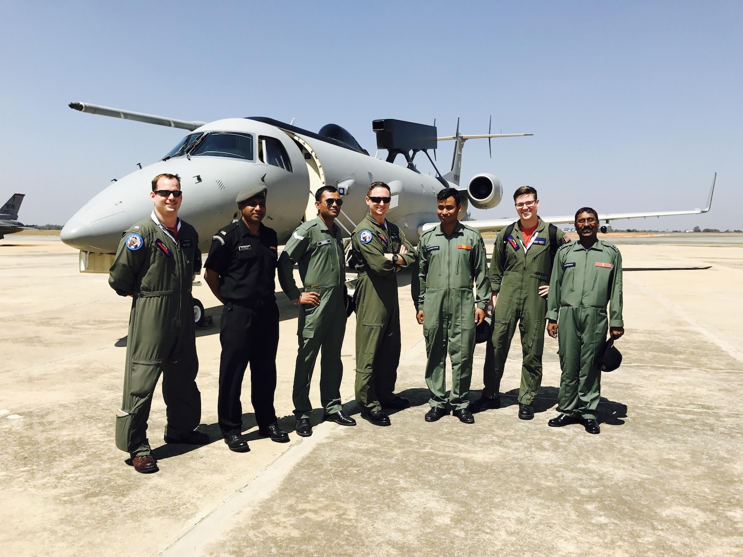 (February 15, 2017) Patrol Squadron Ten (VP-10) Red Lancers pose with members of the Indian Air Force in front of a Defense Research and Development Organization (DRDO) Airborne Early Warning and Control System (AEWACS) at Aero India 2017. 
