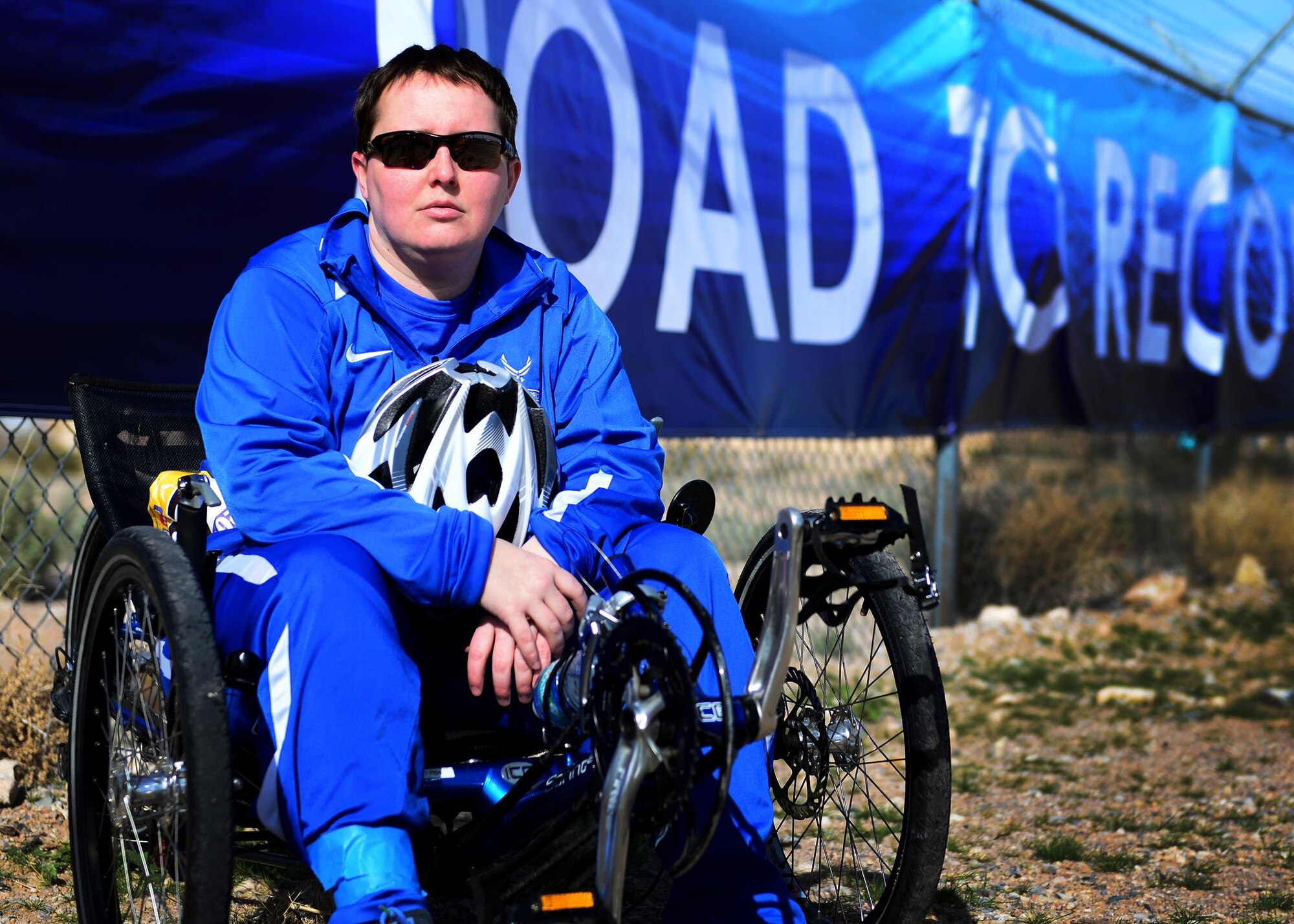 U.S. Air Force retired Senior Airman Jamie Biviano, 2017 AF Trials competitor, poses on her incumbent cycle at Red Horse Feb. 25, 2017 at Nellis Air Force Base, Nev. Biviano hails from Syracuse, New York and served as a Security Forces Airman assigned to the 174th Attack Wing prior to retirement. (U.S. Air Force photo by Senior Airman Chip Pons)