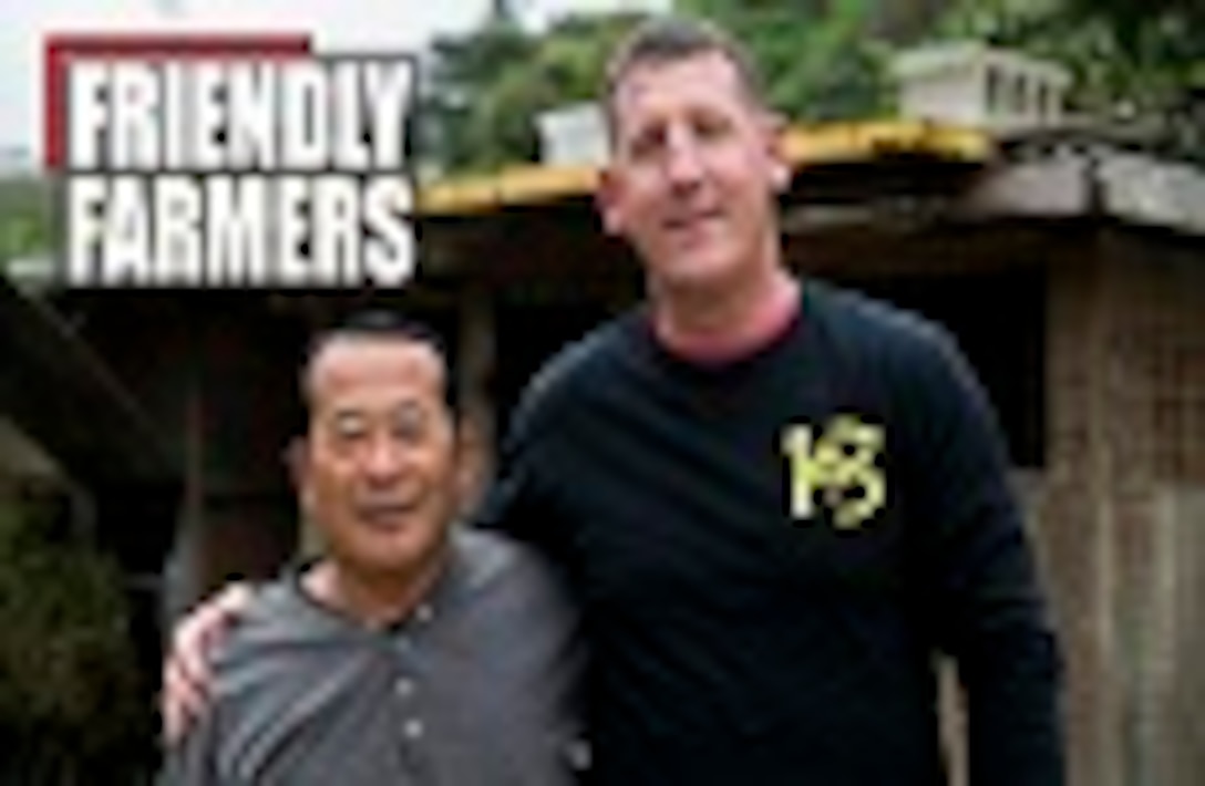 Gunnery Sgt. Todd Groves and Bokusei Kinjo at Kinjo’s farm, near Camp Hansen, Okinawa, Japan, Feb. 23, 2017. Groves is a maintenance chief with Small Craft Repair Platoon, Expeditionary Operations Training Group, III Marine Expeditionary Force, and Kinjo is a local Japanese farmer. Groves, from Fulton, Missouri, was a pig farmer growing up and has now found a place he can call home on Kinjo’s farm. He has helped to take care of the land and the animals on Kinjo’s farm for the last two years. (U.S. Marine Corps photo by Lance Cpl. Bernadette Wildes