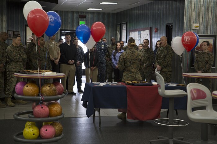 U.S. Marine Corps 1st Lt. Melissa Heisterberg, lead coordinator of the Active-Duty Fund Drive in support of the Navy-Marine Corps Relief Society, speaks to Marines and Sailors about the NMCRS during the drive’s kickoff at the Strike Zone Bowling Center at Marine Corps Air Station Iwakuni, Japan, Feb. 24, 2017. The NMCRS is a non-profit organization whose long-term mission is to help service members become financially self-sufficient by teaching them to manage their personal finances and prepare for unplanned expenditures. (U.S. Marine Corps photo by Lance Cpl. Carlos Jimenez)