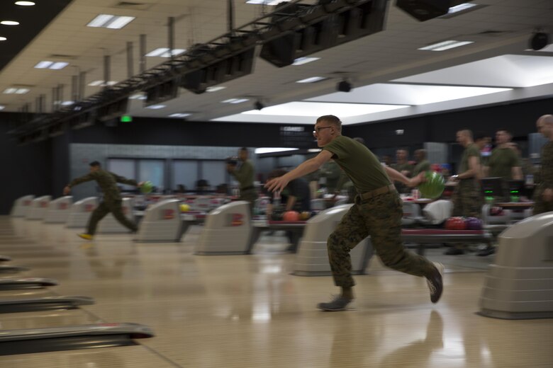 U.S. Marine Corps Lance Cpl. Daniel Sorrells, an individual material readiness list manager with Marine Aviation Logistics Squadron (MALS) 12, bowls during the Active-Duty Fund Drive kickoff in support of the Navy-Marine Corps Relief Society at the Strike Zone Bowling Center at Marine Corps Air Station Iwakuni, Japan, Feb. 24, 2017.  The NMCRS is a non-profit organization whose long-term mission is to help service members become financially self-sufficient by teaching them to manage their personal finances and prepare for unplanned expenditures. (U.S. Marine Corps photo by Lance Cpl. Carlos Jimenez)