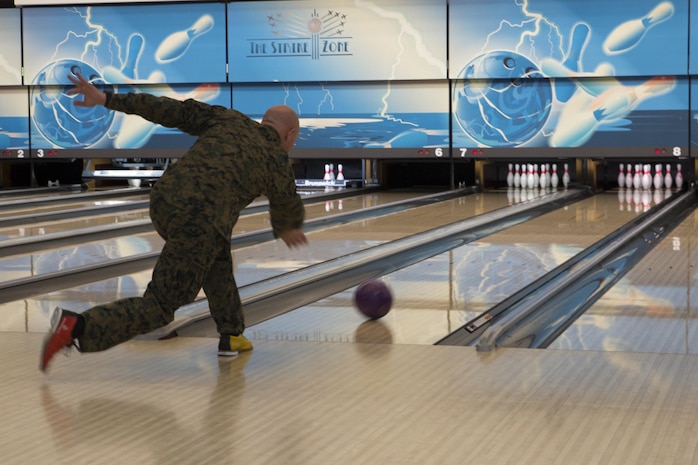 U.S. Marine Corps Col. Richard F. Fuerst, commanding officer of Marine Corps Air Station Iwakuni, bowls during the Active-Duty Fund Drive kickoff event in support of the Navy-Marine Corps Relief Society at the Strike Zone Bowling Center at Marine Corps Air Station Iwakuni, Japan, Feb. 24, 2017.  The NMCRS is a non-profit organization whose long-term mission is to help service members become financially self-sufficient by teaching them to manage their personal finances and prepare for unplanned expenditures. (U.S. Marine Corps photo by Lance Cpl. Carlos Jimenez)