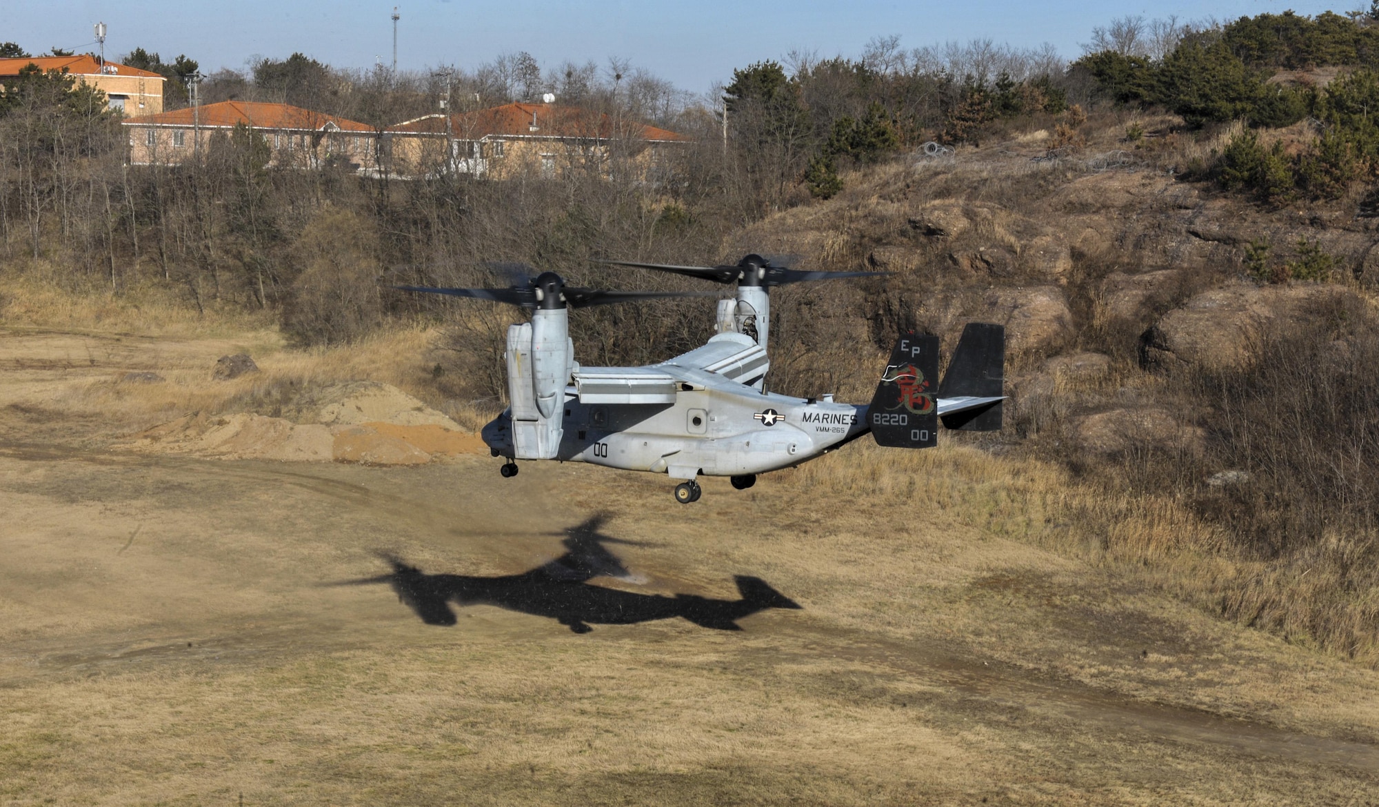 A U.S. Marine MV-22 Osprey prepares to land in a field at Kunsan Air Base, Republic of Korea, Feb. 2, 2017. The MV-22s, assigned to Marine Corps Air Station Futenma, Okinawa, Japan, performed confined area landings patterns while training at Kunsan. (U.S. Air Force photo by Senior Airman Colville R. McFee)