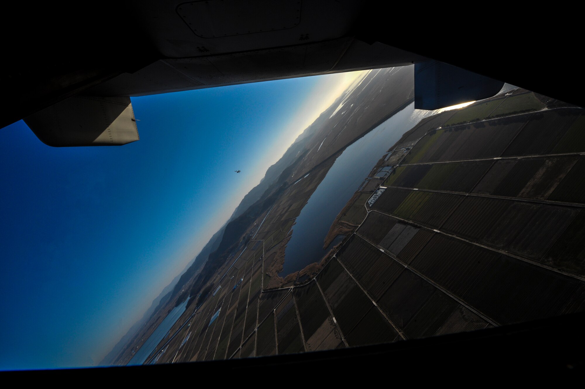 A U.S. Marine MV-22 Osprey flies over the Yellow Sea near Kunsan Air Base, Republic of Korea, Feb. 2, 2017. MV-22s assigned to Marine Corps Air Station Futenma, Okinawa, Japan, performed confined area landings patterns while training at Kunsan. (U.S. Air Force photo by Senior Airman Colville R. McFee)