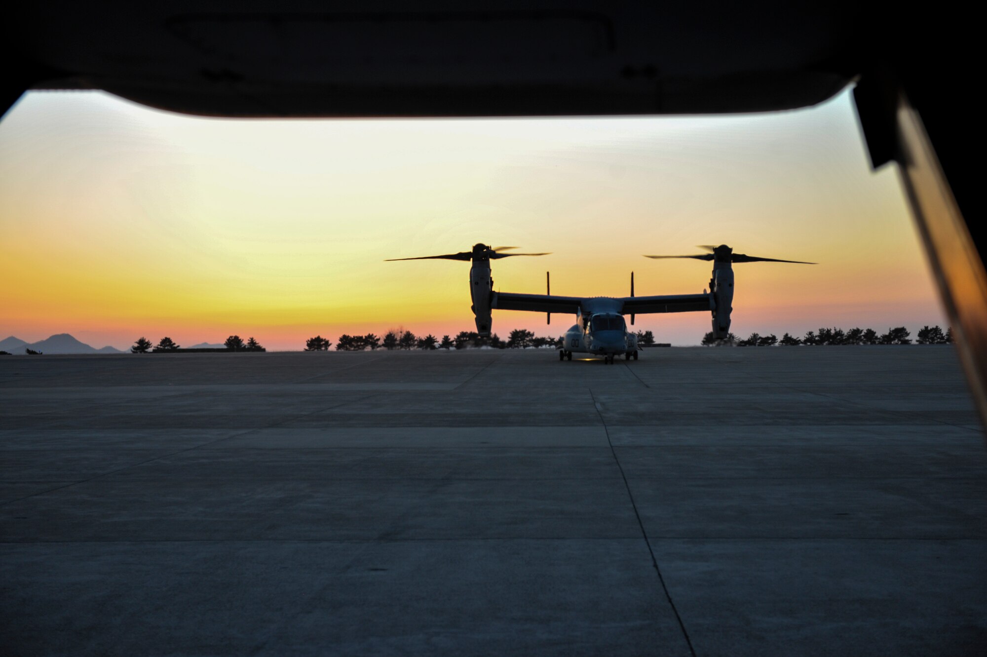 A U.S. Marine MV-22 Osprey taxis into the loading area at Kunsan Air Base, Republic of Korea, Feb. 2, 2017. MV-22s assigned to Marine Corps Air Station Futenma, Okinawa, Japan, performed confined area landings patterns while training at Kunsan. (U.S. Air Force photo by Senior Airman Colville R. McFee)