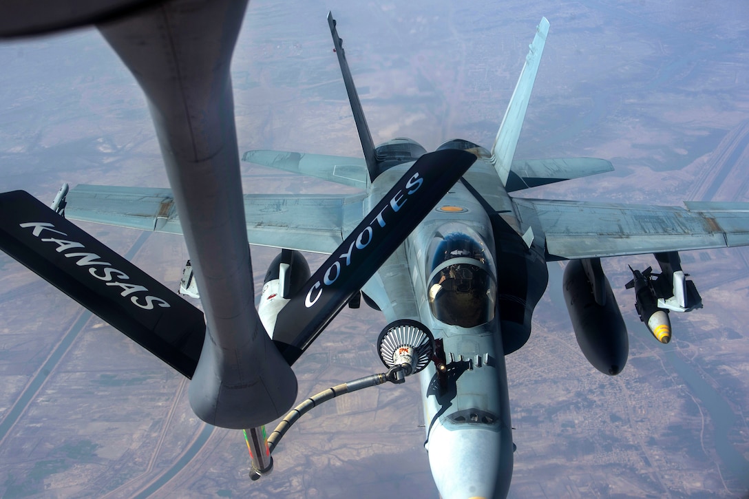 An Australian air force F/A-18 Super Hornet refuels from a U.S. Air Force KC-135 Stratotanker supporting Operation Inherent Resolve, Feb. 22, 2017. Air Force photo by Staff Sgt. Matthew B. Fredericks