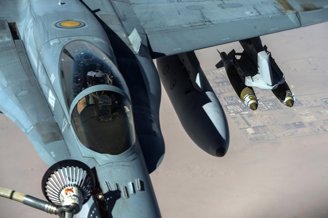 An Australian air force F/A-18 Super Hornet refuels from a U.S. Air Force KC-135 Stratotanker supporting Operation Inherent Resolve, Feb. 22, 2017. Air Force photo by Staff Sgt. Matthew B. Fredericks 