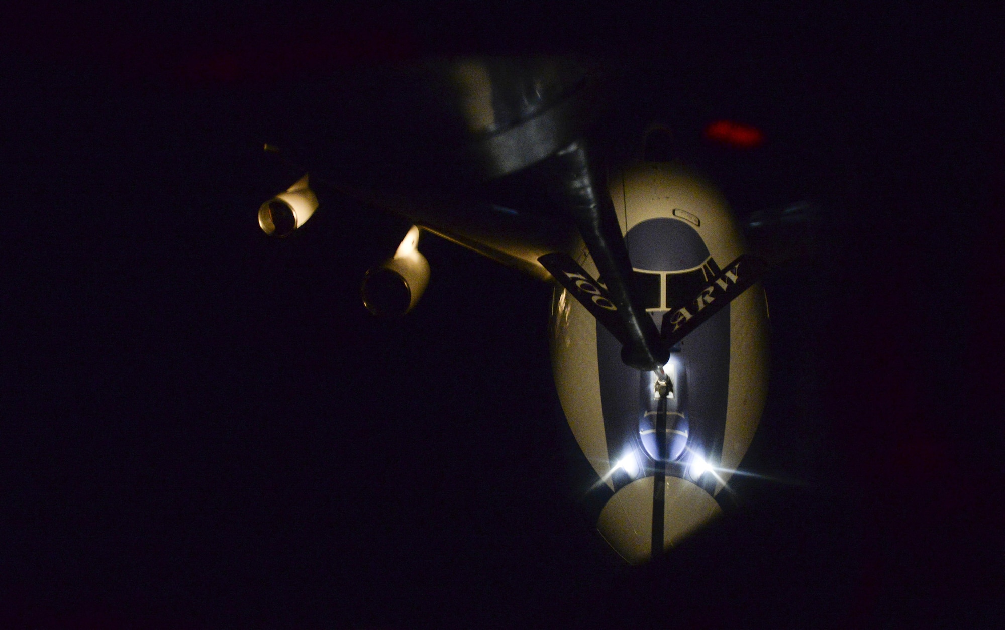 A U.S. Air Force KC-135 Stratotanker assigned to the 100th Air Refueling Wing passes fuel to a U.S. Air Force E-4B transporting the U.S. Secretary of Defense Feb. 20, 2017. The E-4B is protected against the effects of electromagnetic pulse and has an electrical system designed to support advanced electronics and a wide variety of communications equipment. An advanced satellite communications system provides worldwide communication for senior leaders through the airborne operations center. Other improvements include nuclear and thermal effects shielding, acoustic control, an improved technical control facility and an upgraded air-conditioning system for cooling electrical components. (U.S. Air Force photo by Staff Sgt. Micaiah Anthony)