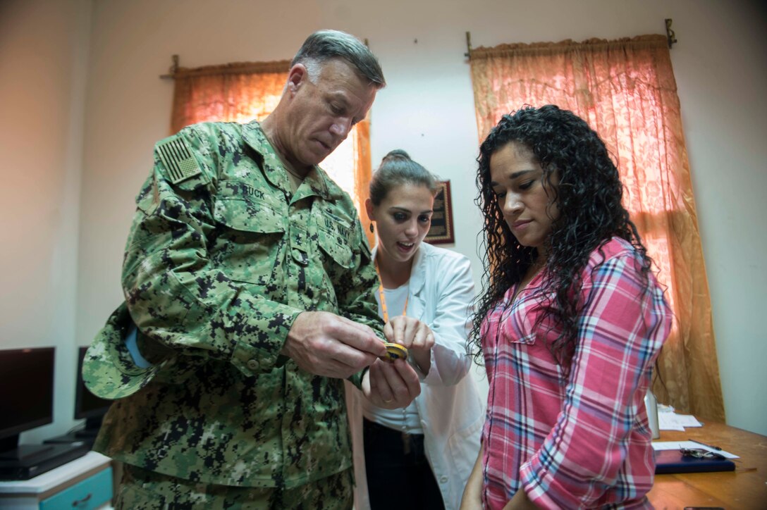 170223-N-YM856-041 TRUJILLO, Honduras (Feb. 23, 2017) - Commander, U.S. Naval Forces Southern Command/U.S. 4th Fleet (USNAVSO/FOURTHFLT) Rear Adm. Sean S. Buck presents his command coin to Hospital Salvador Paredes Sub-Director Dr. Xiomara Arita during a tour of the facility in support of Continuing Promise 2017’s (CP-17) visit to Trujillo, Honduras. CP-17 is a U.S. Southern Command-sponsored and U.S. Naval Forces Southern Command/U.S. 4th Fleet-conducted deployment to conduct civil-military operations including humanitarian assistance, training engagements, and medical, dental, and veterinary support in an effort to show U.S. support and commitment to Central and South America. (U.S. Navy Combat Camera photo by Mass Communication Specialist 2nd Class Brittney Cannady)