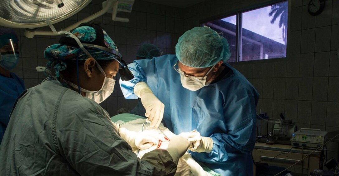 TRUJILLO, Honduras (Feb. 23, 2017) - Cmdr. Chris Crecelius, an oral and maxillofacial surgeon assigned to Walter Reed National Military Medical Center Bethesda, Md., performs surgery at Hospital Salvador Paredes during Continuing Promise 2017Õs (CP-17) visit to Trujillo, Honduras. CP-17 is a U.S. Southern Command-sponsored and U.S. Naval Forces Southern Command/U.S. 4th Fleet-conducted deployment to conduct civil-military operations including humanitarian assistance, training engagements, and medical, dental, and veterinary support in an effort to show U.S. support and commitment to Central and South America. (U.S. Navy Combat Camera photo by Mass Communication Specialist 2nd Class Brittney Cannady)