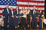 Ms. Jackie Ezell with the 151st Mission Support Group accepts her award for Civilian of the Year during the Utah Air National Guard 2016 Airman of the Year awards banquet held at the Utah Cultural Center in West Valley, Utah on Jan. 21, 2017. (U.S. Air National Guard photo by Tech. Sgt. Annie Edwards)