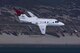 A 99th Flying Training Squadron, Joint Base San Antonio-Randolph, Texas, T-1A Jayhawk flies along the Texas coast during a training mission. The 99th FTS conducts Pilot Instructor Training and continues the heritage of the Tuskegee Airmen with their distinctive red tail. (Courtesy Photo)
