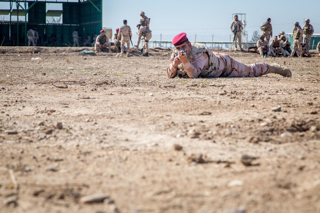 An Iraqi security forces soldier scans for possible threats during react to contact refresher training at Camp Taji, Iraq, Feb. 25, 2017. The soldiers attended the Junior Leaders Course led by Coalition forces designed to enhance basic combat skills in support of Combined Joint Task Force – Operation Inherent Resolve, the global Coalition to defeat ISIS in Iraq and Syria.  (U.S. Army photo by Spc. Christopher Brecht)