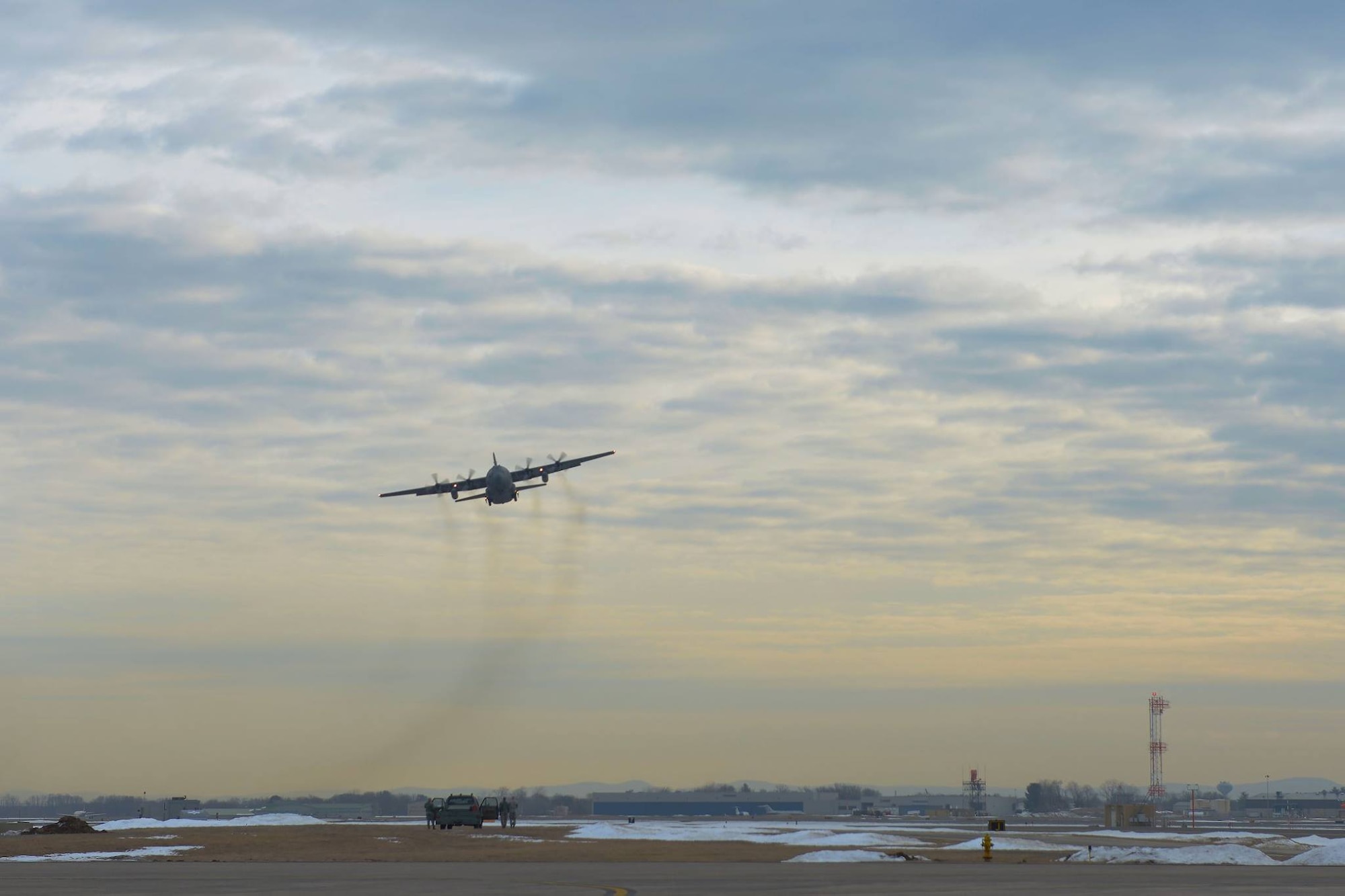 A 103rd Airlift Wing C-130 Hercules, with deploying Airmen on board, takes off from Bradley Air National Guard Base, East Granby, Conn., Feb. 22, 2017. This C-130 is headed to the Middle East in support of deployment operations. (U.S. Air National Guard photo by 2nd Lt. Jen Pierce)