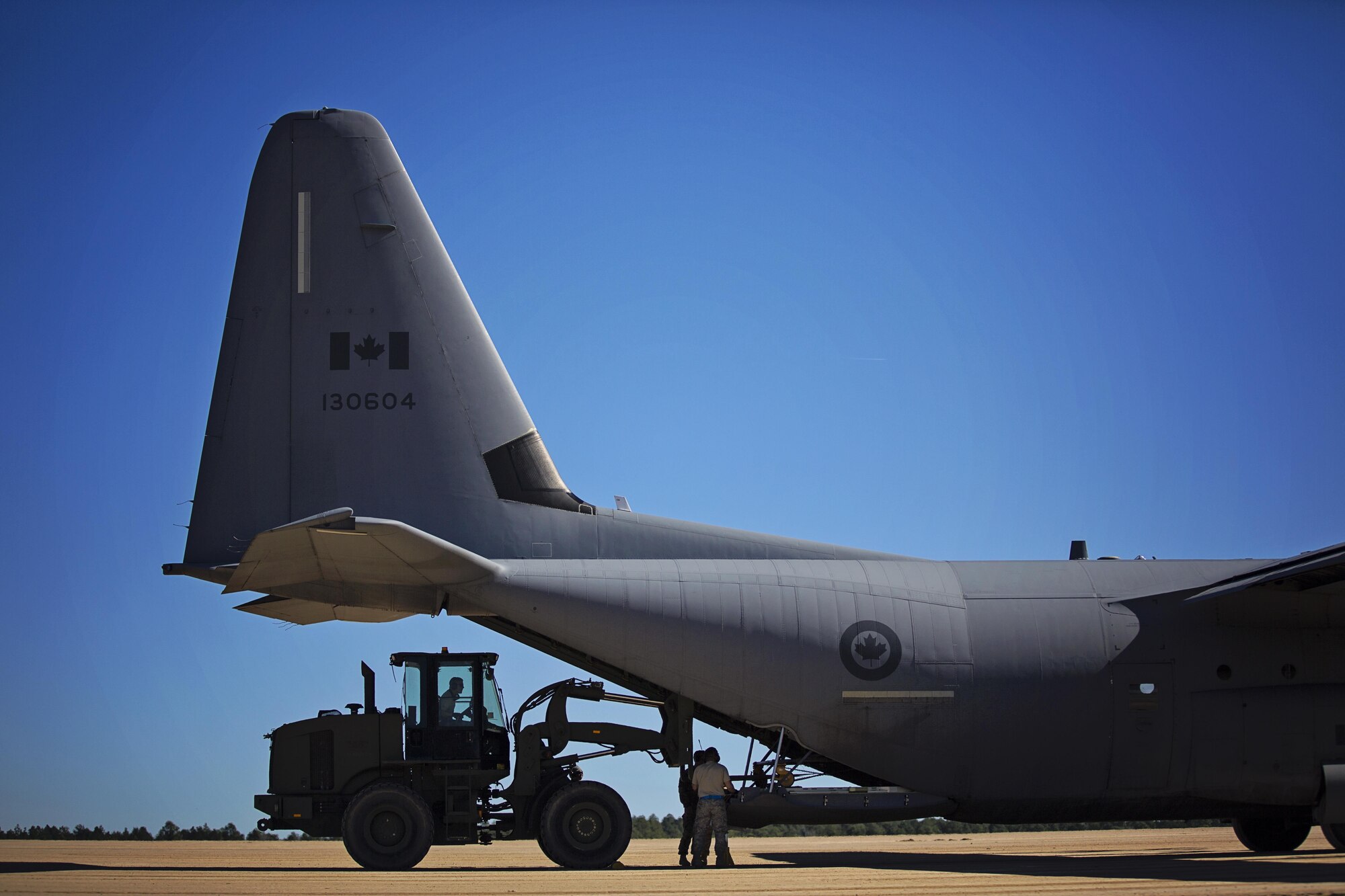 Tech. Sgt. Christopher Wilson, air transportation, 46th Aerial Port Squadron, prepares to offload cargo during training at the Joint Readiness Training Center, Fort Polk, Louisiana, Feb. 15, 2017.   Wilson joined other Airmen from the 512th Airlift Wing located at Dover Air Force Base, Del., to conduct training and provide support to Army units who were training also at JRTC. (U.S. Air Force photo/Capt. Bernie Kale)