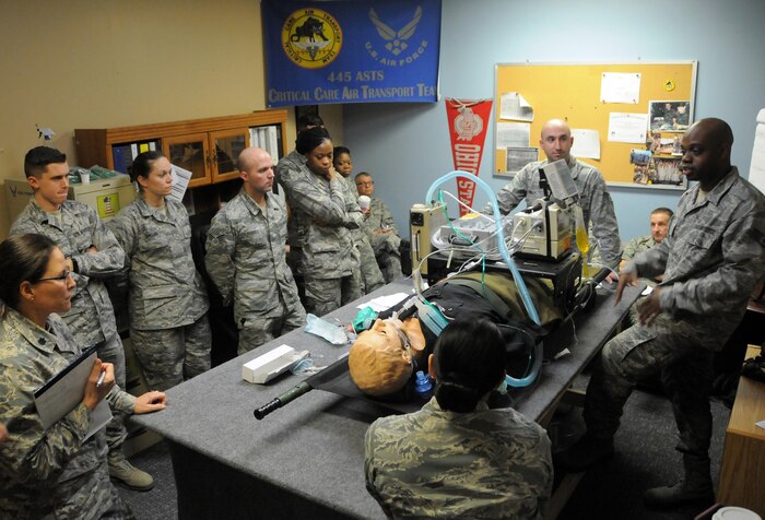Staff Sgt. Samuel Collier, 445th Aeromedical Staging Squadron cardiopulmonary lab journeyman, instructs to his fellow ASTS Airmen cardiopulmonary techniques during a training event Feb. 12, 2017. The training event consisted of litter transport and CCAT (Critical Care Air Transport Team) training. Each unit training assembly weekend will have one dedicated day of such training to prepare ASTS Airmen for the August 2017 Patriot Warrior exercise,  the Air Force Reserve Command portion of an immense joint field exercise involving nearly 6,000 Airmen, Sailors, Soldiers, and multinational forces. (U.S. Air Force photo/Tech. Sgt. Anthony Springer)