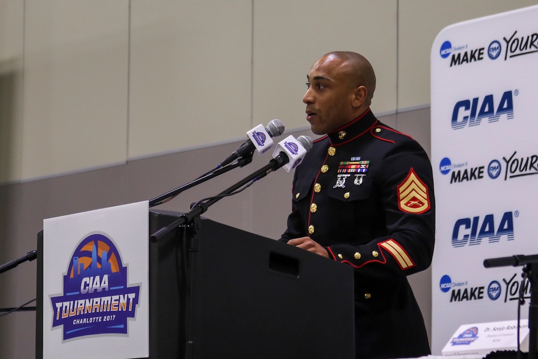Staff Sgt. Eric Rogers, a recruiter with recruiting substation Rockhill, Recruiting Station Columbia, welcomes attendants of the Central Intercollegiate Athletic Association (CIAA) Education Day at the Charlotte Convention Center on Feb. 22, 2017. The Marines take part in the Education Day at the CIAA to help spread awareness and inform others of the opportunities the Marine Corps can provide. The Education Day assists recruiters by offering them different tools to reach students across the state. (U.S. Marine Corps photo by Lance Cpl. Jack A. E. Rigsby/Released)