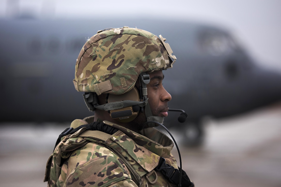 Air Force Staff Sgt. Rashon Battle provides security for a C-130J Hercules aircraft and its aircrew at Camp Bastion, Afghanistan, Feb. 17, 2017. Battle is a security team member assigned to the 455th Expeditionary Security Forces Squadron. Air Force photo by Staff Sgt. Katherine Spessa