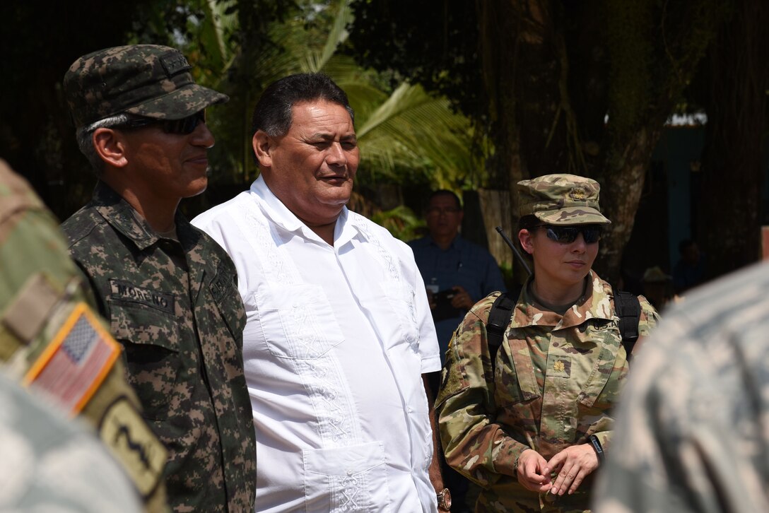 Col. Tito Livio Moreno, Commander of the Honduran 105th Infantry Brigade (left), Mr. Ricardo Alvarado Mayor of Omoa (center) and U.S. Army Maj. Rosemary Reed, Deputy Commander of Joint Task Force-Bravo Civil Military Operations, tour the facilities where a Medical Readiness Training Exercise is taking place in Corinto, Cortes, Feb. 16, 2017. The MEDRETE included participation from JTF-Bravo personnel, Honduran Ministry of Health providers, Red Cross volunteers and local military. (U.S. Army photo by Maria Pinel)
   
