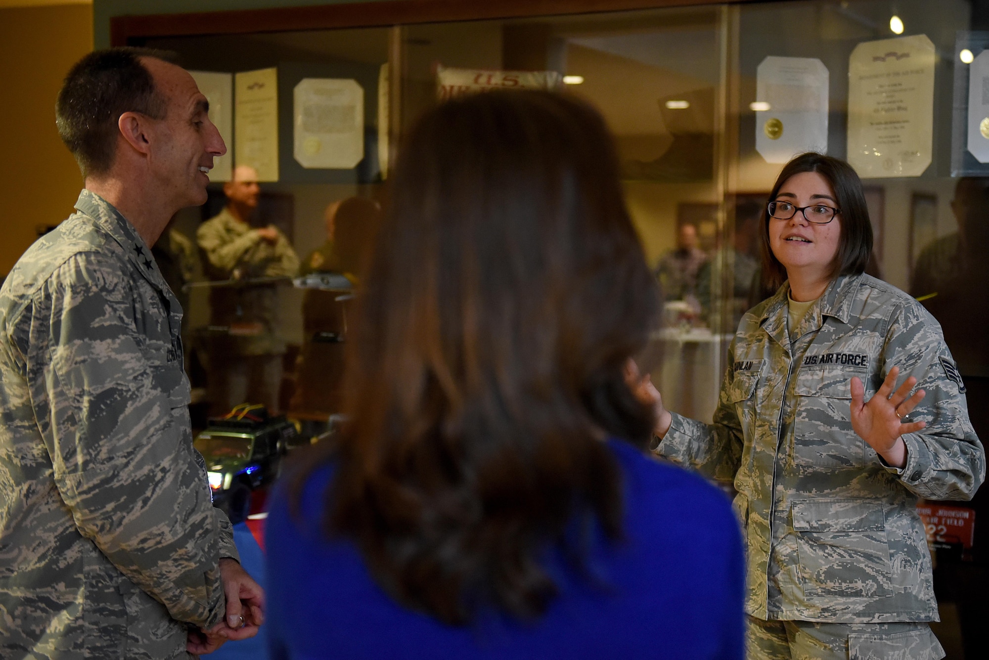 U.S. Air Force Maj. Gen. Scott Zobrist (left), 9th Air Force commander, discusses the Make It Better book club with Staff Sgt. Catherine Quinlan (right), 4th Force Support Squadron manpower analyst at Seymour Johnson Air Force Base, N.C., Feb. 15, 2017. Quinlan is the president of the book club which has more than 100 members. (U.S. Air Force photo by Airman 1st Class Kenneth Boyton)
