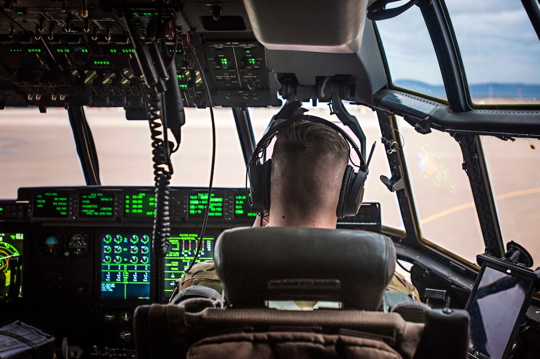 Air Force Capt. Jesse Moulton prepares for takeoff on a mission from Herat to Hamid-Karzai International Airport, Afghanistan, Feb. 17, 2017. Moulton is a pilot assigned to the 774th Expeditionary Airlift Squadron. Air Force photo by Staff Sgt. Katherine Spessa