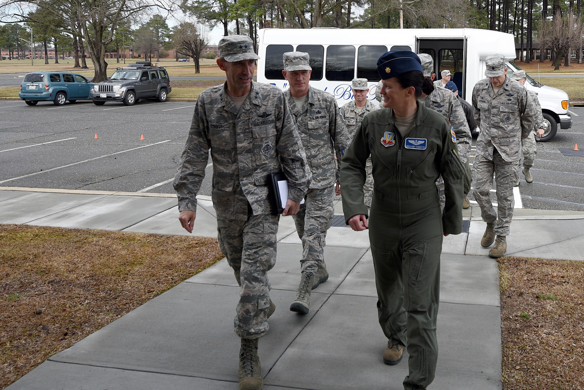 Members of 9th Air Force and Team Seymour leadership walk to the newly built 4th Operations Support Squadron Weapons and Tactics Razor Talon War Room at Seymour Johnson Air Force Base, N.C., Feb. 15, 2017. The War Room will enhance communications and other capabilities during future exercises such as Razor Talon an exercise that began in 2013 and was developed at Seymour Johnson AFB to combine land, air and sea forces for joint unit participation and collaboration. (U.S. Air Force photo by Airman 1st Class Kenneth Boyton)