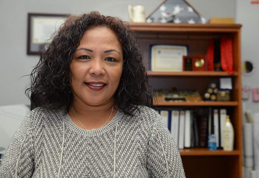 Eileen Rodriguez, McChord Field airfield manager, smiles for a photo Feb. 21, 2017, at Joint Base Lewis-McChord, Wash. Rodriguez has served at McChord since 2004, and is a cancer survivor, who attributes her healing to the strong support she received from her squadron members. (U.S. Air Force photo/Senior Airman Jacob Jimenez)