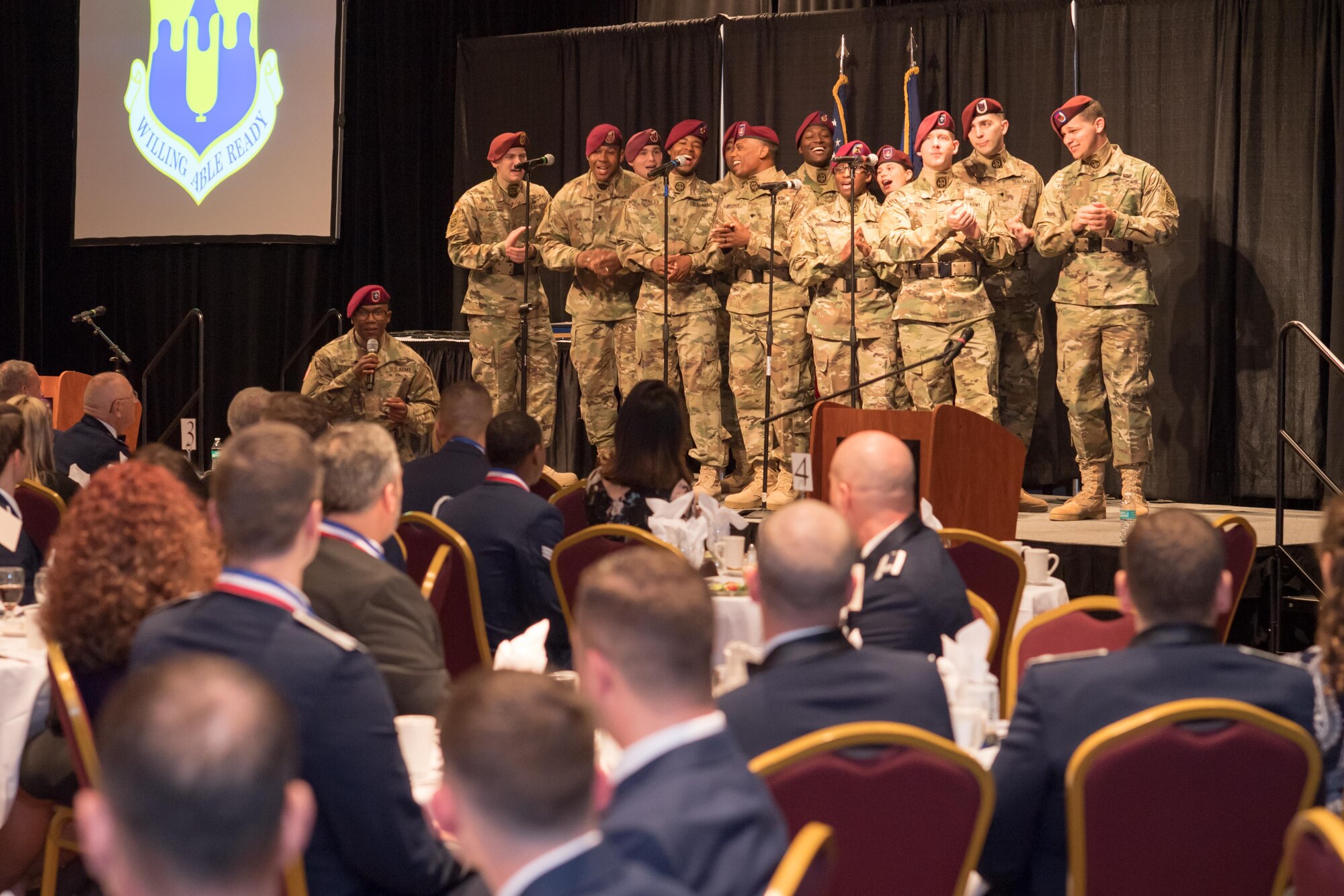 The U.S. Army's 82nd Airborne Division Chorus performs during the 43d Air Mobility Operations Group annual awards banquet at the Crown Coliseum here Feb. 23. The group honored its award winners for 2016 during the event. (U.S. Air Force photo/Marc Barnes) 