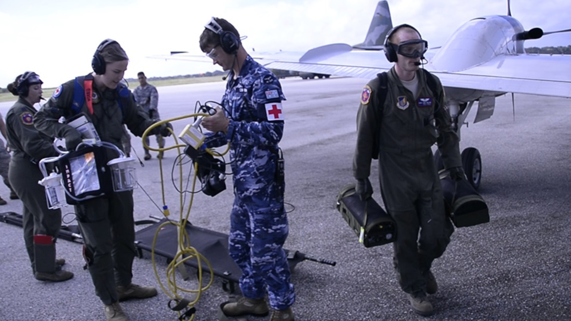 Aeromedical Evacuation Airmen from the U.S., Japanese and Australian air forces transport a simulated patient to a U.S. Air Force C-12 Huron as part of annual exercise Cope North Feb. 21, 2017, at Tinian Air Field. Aeromedical evacuation training was conducted on the Huron to familiarize airmen with patient care on a new airframe. Cope North is a long-standing exercise designed to enhance multilateral air operations between the partnered militaries, bringing together more than 2,700 U.S. Airmen, Sailors and Marines who are training alongside approximately 600 combined JASDF and RAAF participants. 