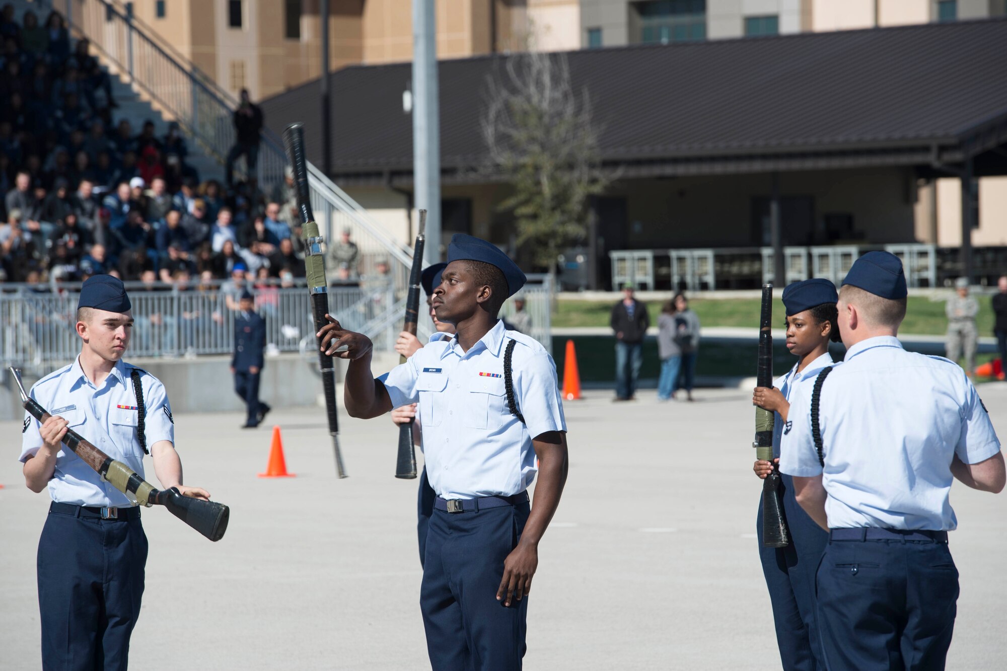 Members of the 343rd Training Squadron drill team perform drill movements in the regulation round of the 37th Training Wing Drill Down Invitational at the Pfingston Reception Center at Joint Base San Antonio-Lackland, Texas, Feb 25, 2017. The competition consisted of an open ranks inspection, a regulation drill performance and a freestyle drill performance from each team.